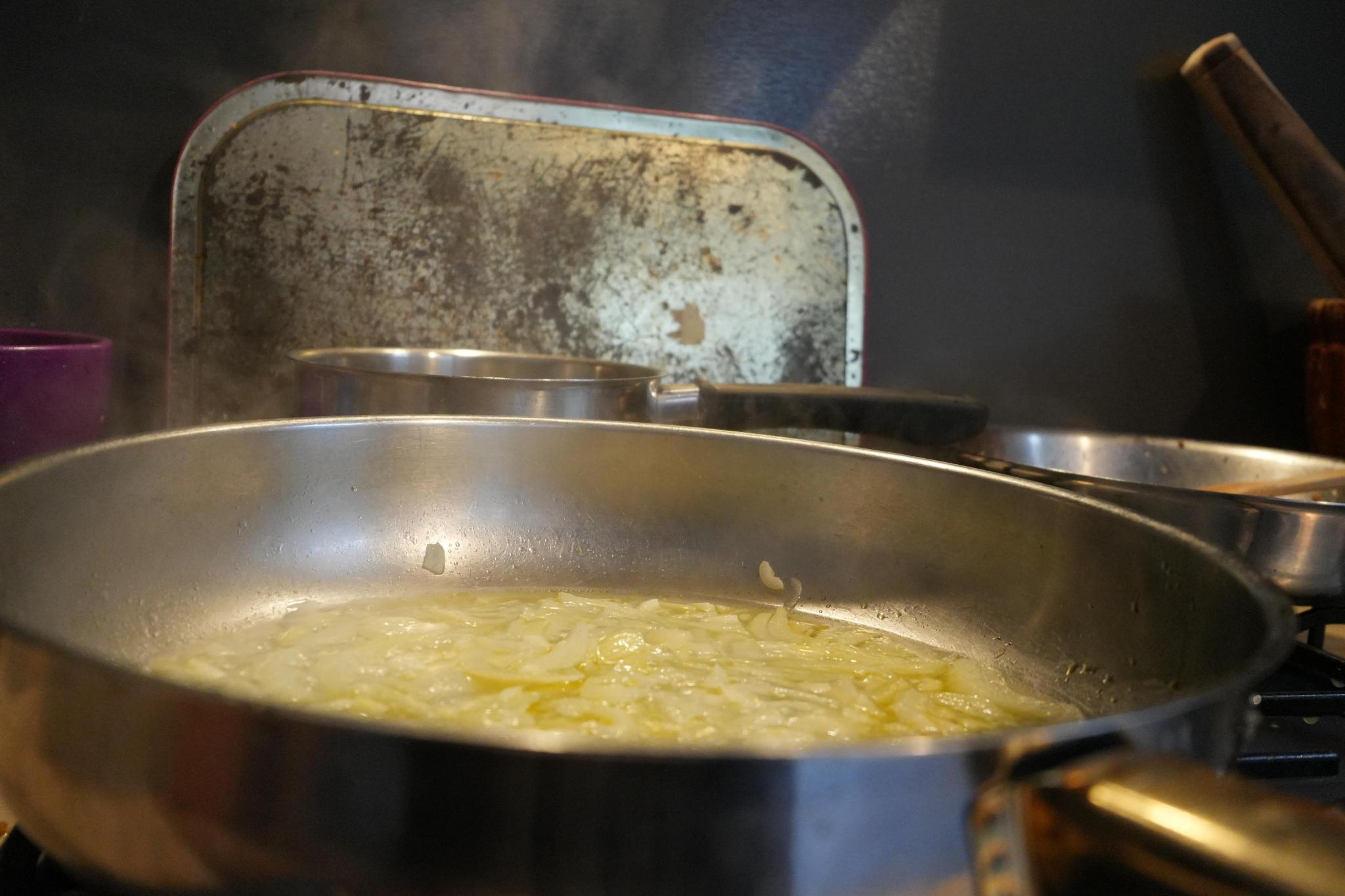 vegetables frying in a pan