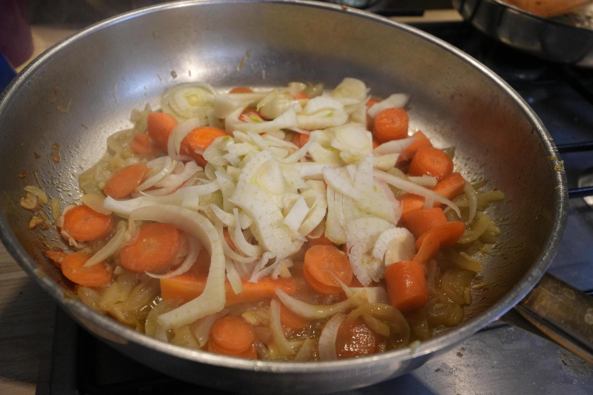 pan with newly added carrots and fennel