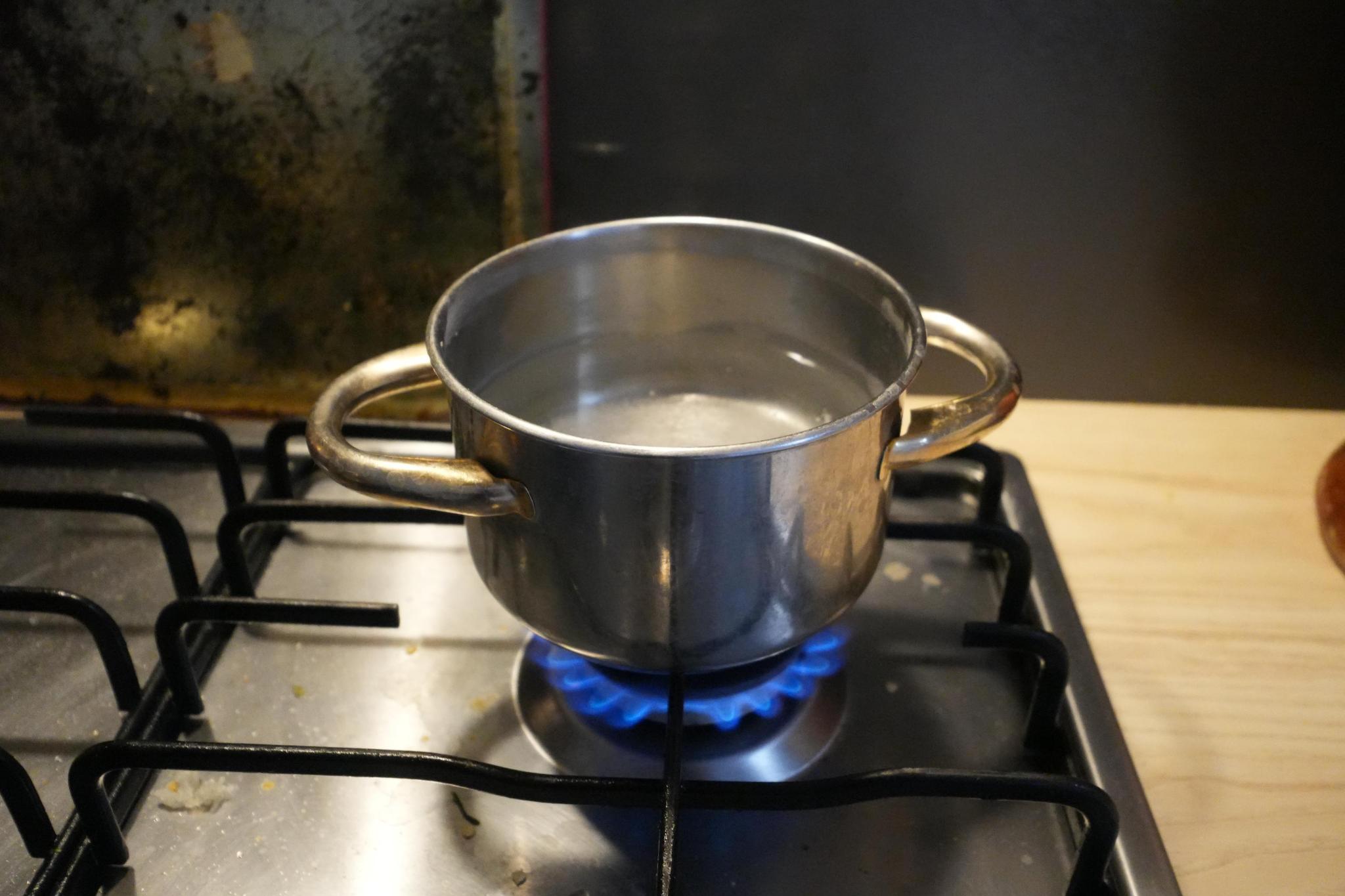 pan with boiling water for hard boiled eggs